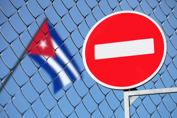 istock cube flag behind a fence with a sign is forbidden 944526252