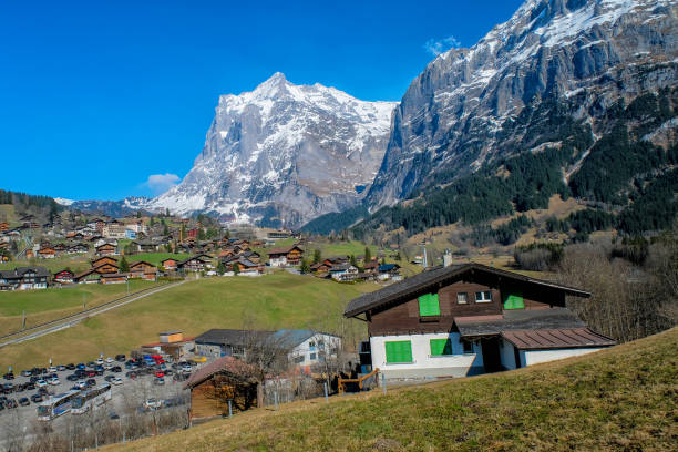 panoramic view of grindelwald beautiful village in mountain scenery, switzerland - interlaken railroad station train rural scene imagens e fotografias de stock