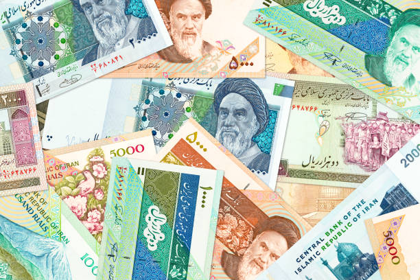 a lot of iranian rial bank notes - iranian currency imagens e fotografias de stock