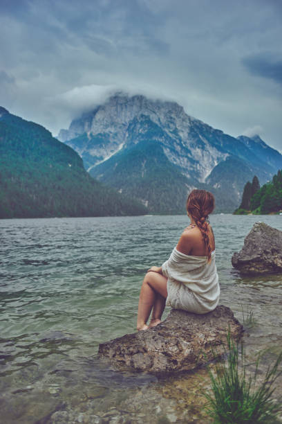 istock Lady at the lake 944530676
