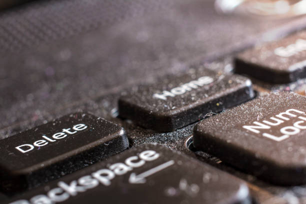 istock dirty laptop keyboard macro, front and back background blurred 944533726