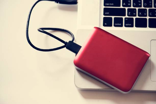 istock External Hard disk drive connect to laptop 944534088