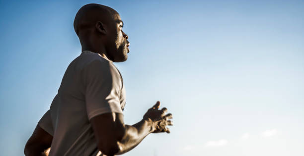 istock Male athlete running 944535206