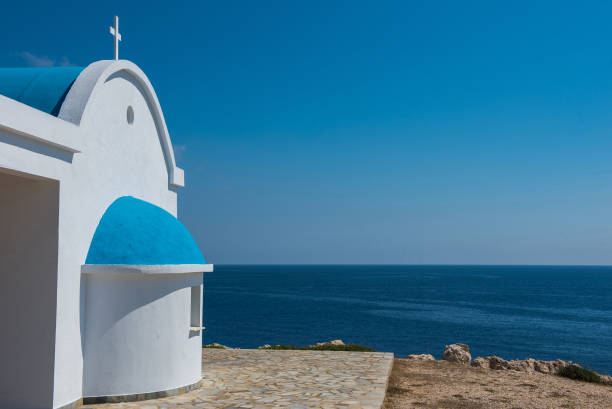 istock Whitewashed chapel near the sea 944535528