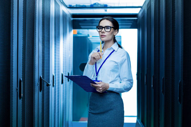 istock Inspired woman thinking and holding a folder 944539400