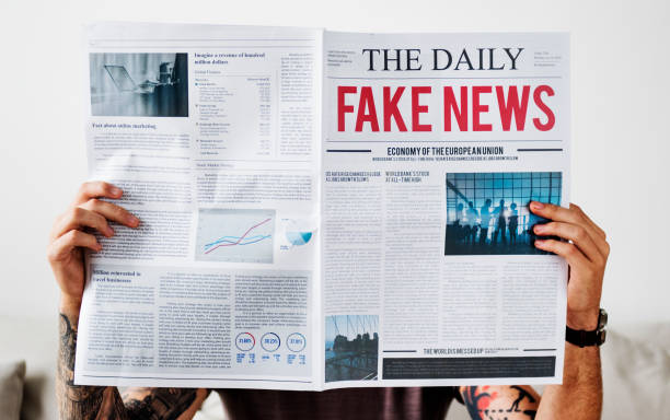 istock Fake news headline on a newspaper 944542696