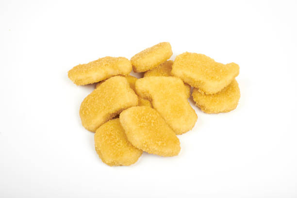 istock Chicken nuggets isolated on white background 944550508