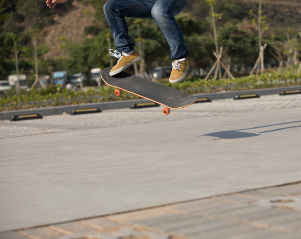 istock Skateboarder sakteboarding on parking lot 944558968
