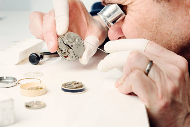 istock Close Up Portrait of a Watchmaker at Work 944559020