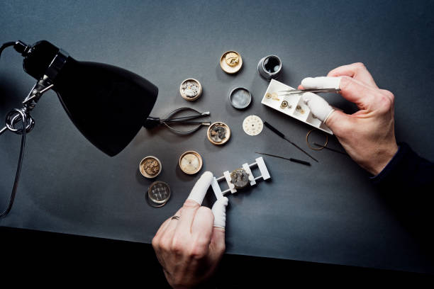 istock Overhead View of a Watchmaker at Work 944560450