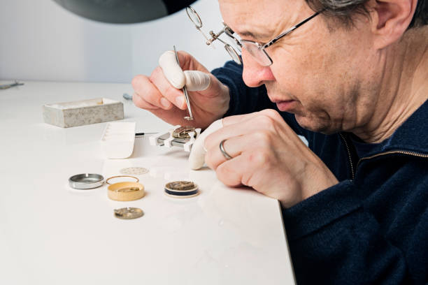istock Close Up Portrait of a Watchmaker at Work 944561292