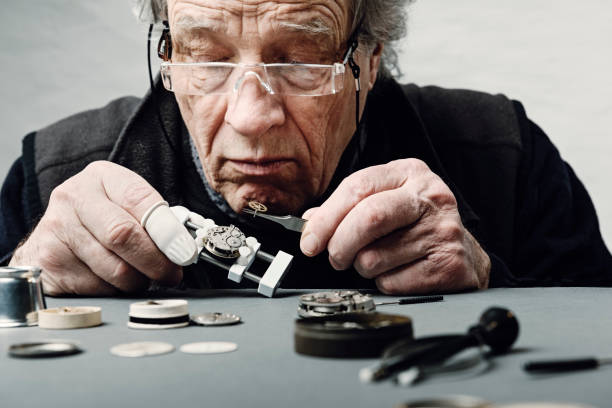 istock Close Up Portrait of a Watchmaker at Work 944561352