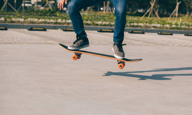 istock Skateboarder sakteboarding on parking lot 944561878