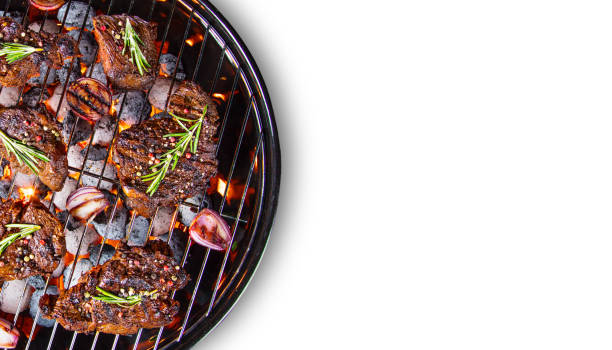 istock Barbecue grill with beef steaks, close-up 944562174