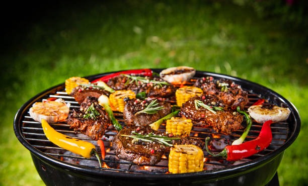 istock Barbecue grill with beef steaks, close-up 944562308