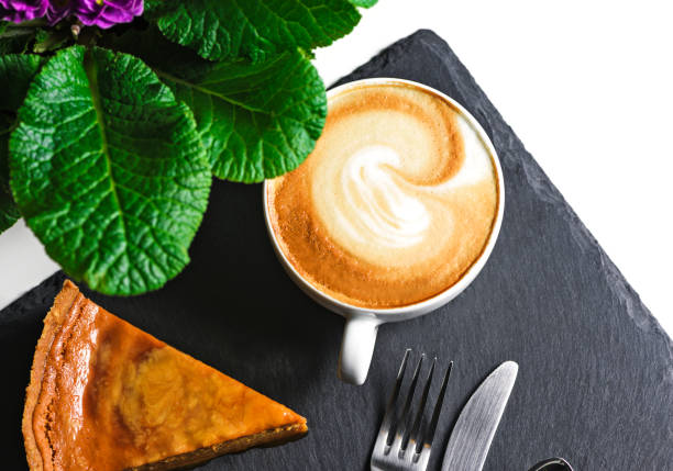 istock Light breakfast: a cup of cappuccino and pie. 944562554