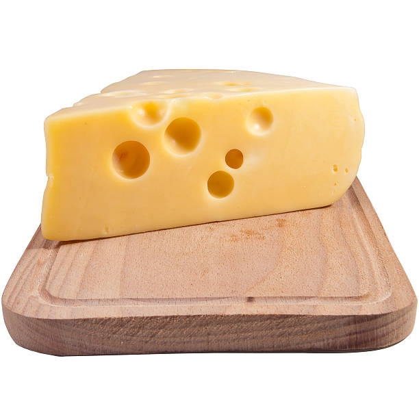 istock cheese on a grunge wooden board. 94456436