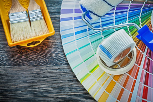 istock painting tools on black wood board 944565186