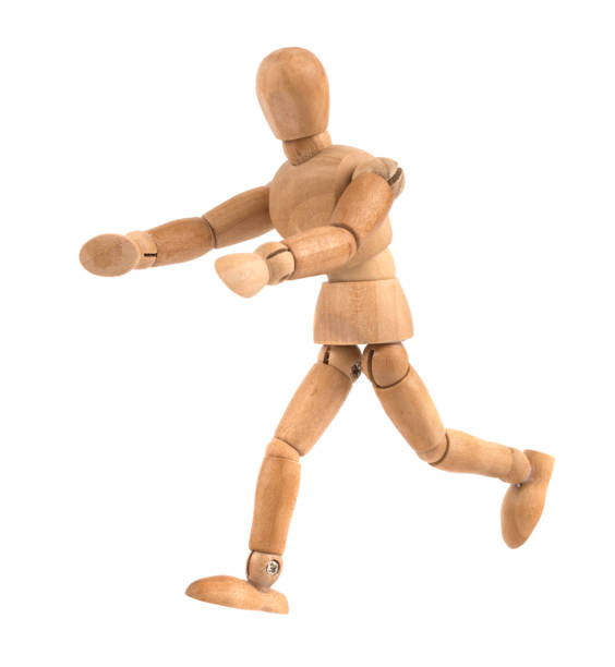 istock running wooden mannequin with hands forward 944566630