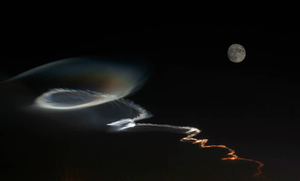 Moon Trail  contrail moon on a night sky stock pictures, royalty-free photos & images