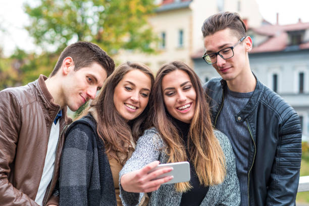 istock Young friends taking selfie 944570374