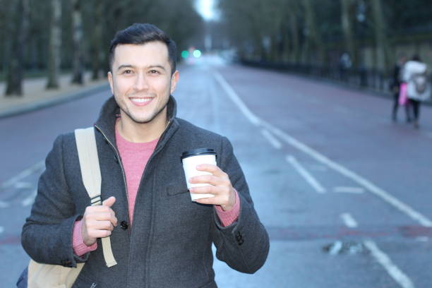istock Joyful man starting the day with coffee 944574190