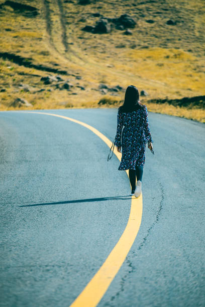 istock Young woman walking on her way 944577036