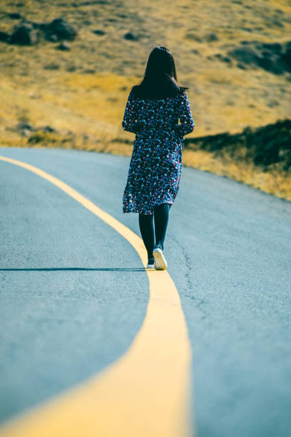 istock Young woman walking on her way 944577038