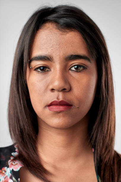 istock Studio portrait of mixed race woman with serious expression 944577538