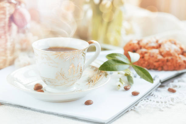 istock Cup of coffee with flowers 944577650