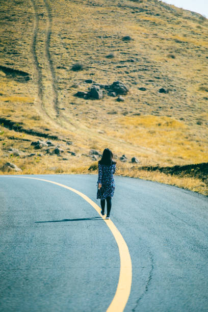 istock Young woman walking on her way 944577766