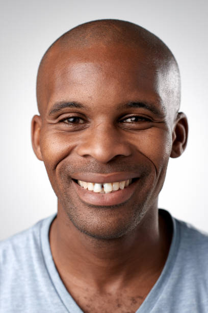 istock Studio portrait of African man smiling 944577804