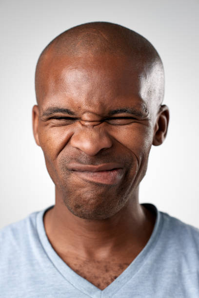 istock Studio portrait of African man pulling a silly facial expression 944577830