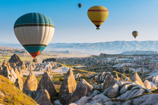 istock Hot air balloons flying over Cappadocia, Turkey 944580634