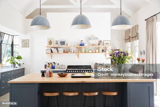 Large Family Kitchen In Period Conversion House Straight On Stock Photo - Download Image Now