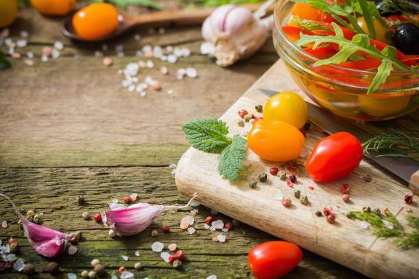 istock vegetables and olives on old wooden background 944582092