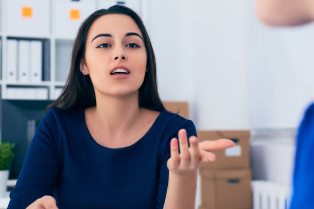 istock Young female collar smiling during meeting in office conference room. Team work concept. 944584968
