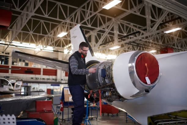 istock Aircraft mechanic in the hangar 944596184