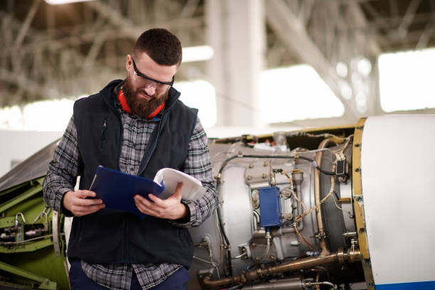 istock Aircraft mechanic in the hangar 944596252