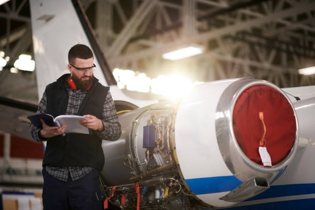 istock Aircraft mechanic in the hangar 944596704