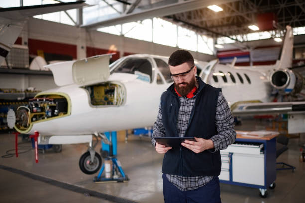 istock Aircraft mechanic in the hangar 944597294