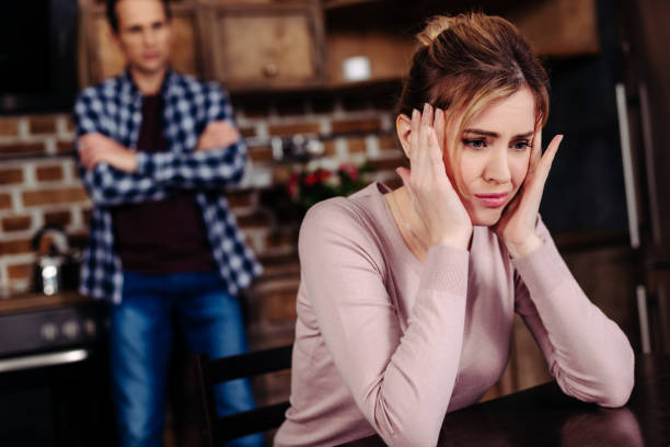 istock selective focus of argued couple in kitchen at home, relationship difficulties concept 944601036