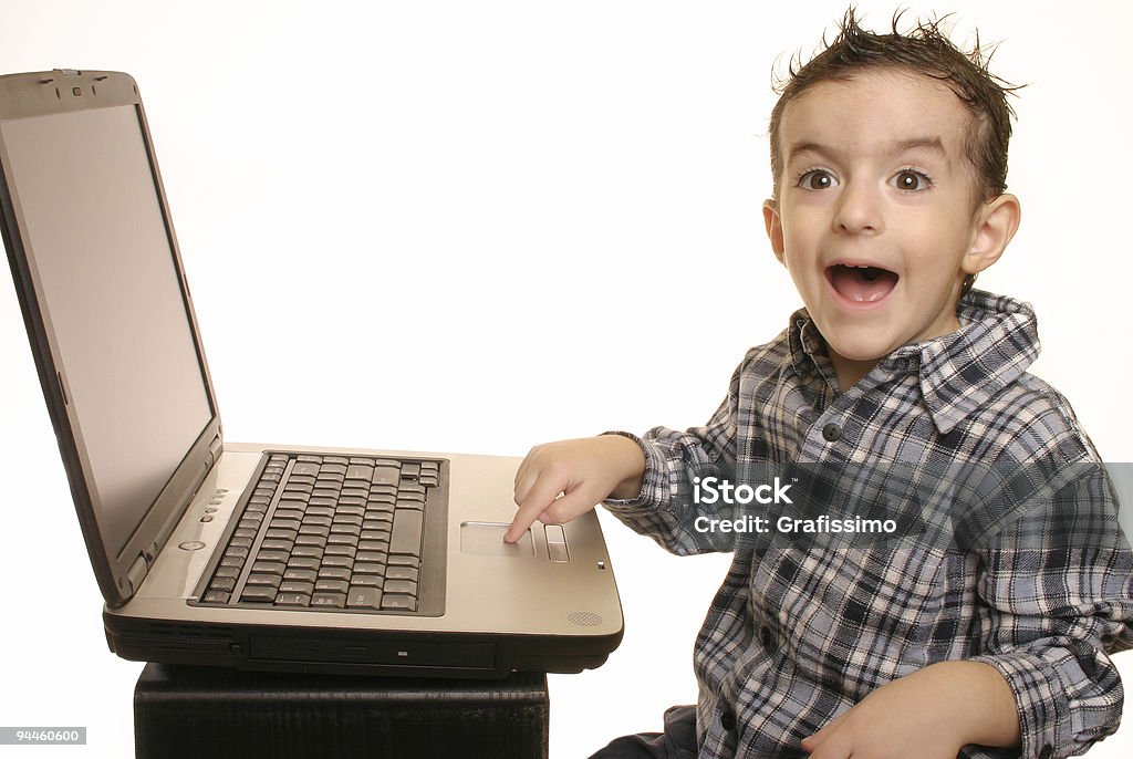 Chico trabajando en una computadora portátil 3 - Foto de stock de Niños libre de derechos