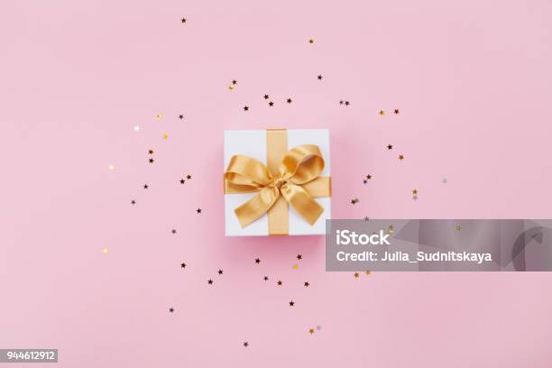 Gift Or Present Box And Stars Confetti On Pink Pastel Table Top View Flat Lay Composition For Birthday Mother Day Or Wedding Stock Photo - Download Image Now