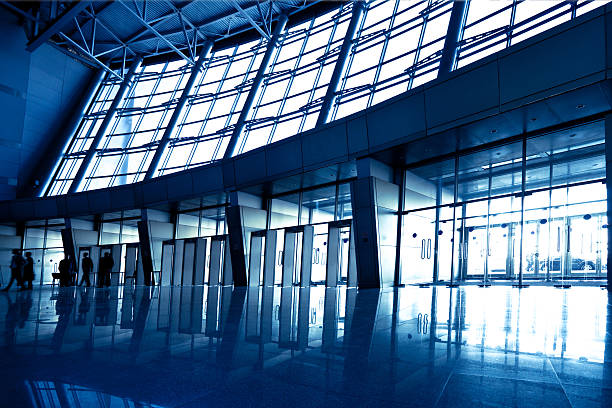 istock Interior of a wide blue hall with light beaming inside 94461582