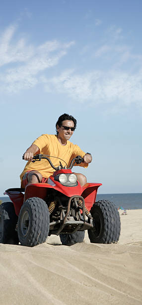 istock Fourwheeler in the sand 94462409