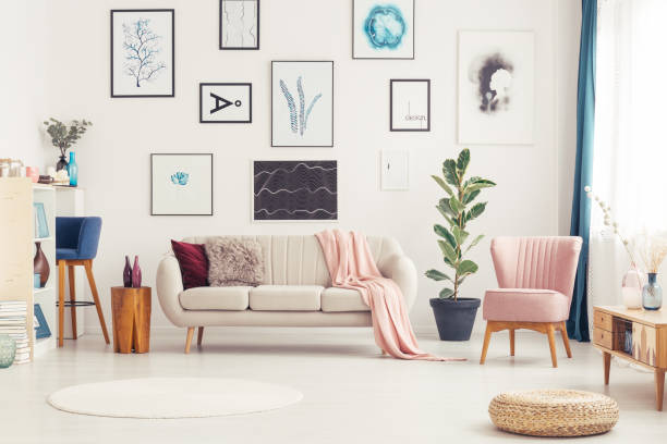 istock Spacious pink living room interior 944631526
