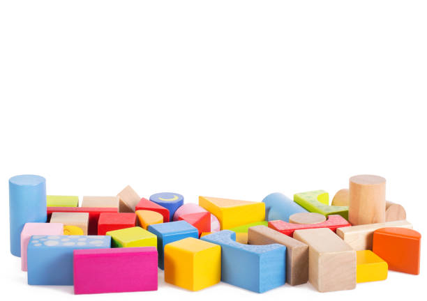 istock Colorful wooden building blocks isolated on whit 944634162