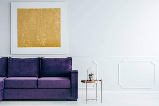 istock Gold and violet living room 944637604