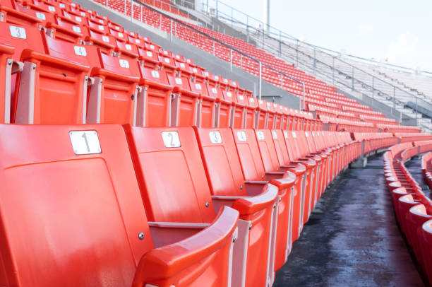 istock Empty orange seats at stadium,Rows of seat 944641764